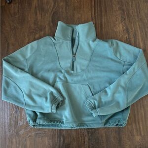 Lululemon cropped teal quarter-zip size 6